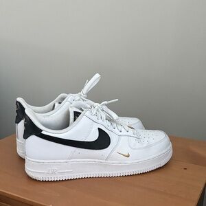 Nike Air Force 1 White with Black and Gold Accents